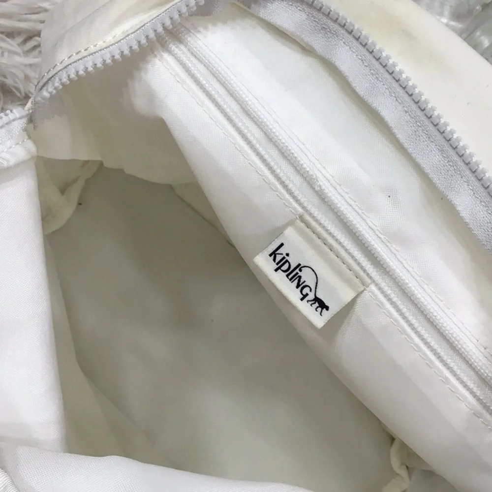 Kipling Cream Backpack with Monkey Charm